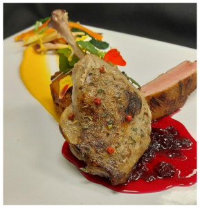 Duet of Duck with Spiced Grape Gastrique and a Foie Gras & Morel Mushroom Bread Pudding