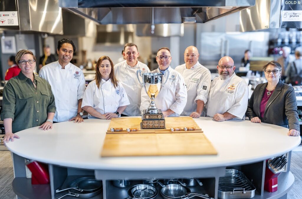 Judges and coaches from the 2024 Cooks the Books Competition