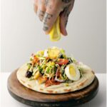 SABICH with CUCUMBER, TOMATO, and PICKLED HOT PEPPERS