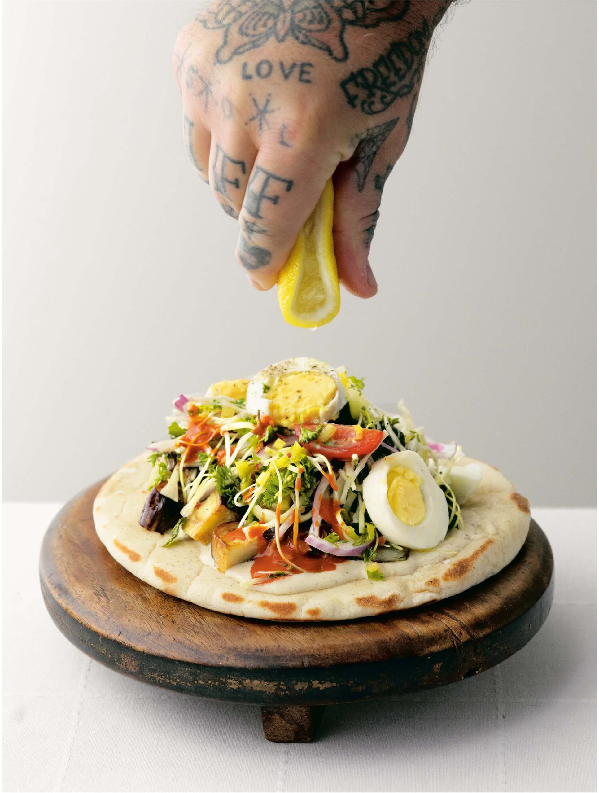 SABICH with CUCUMBER, TOMATO, and PICKLED HOT PEPPERS