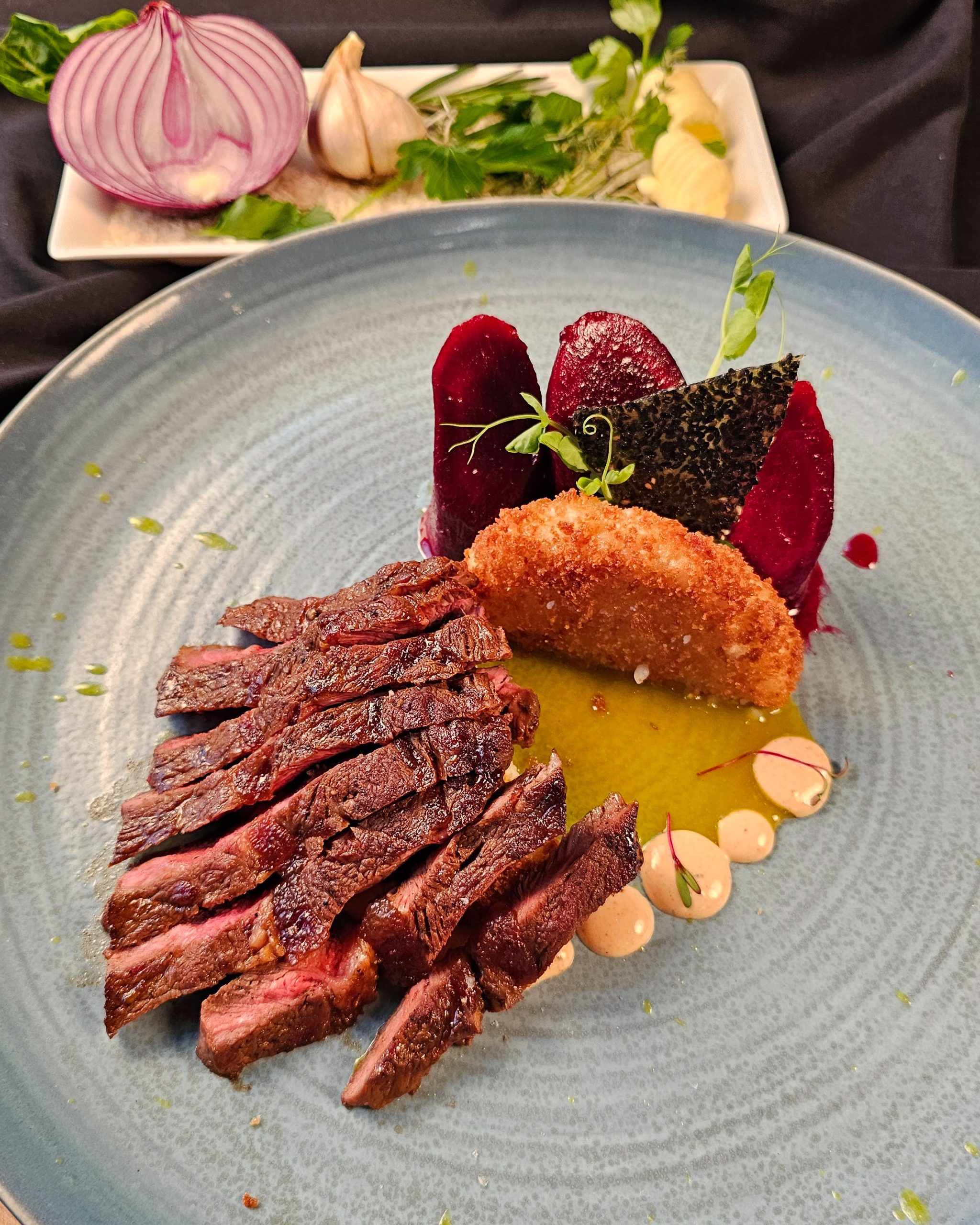 Birch Wasabi Flat Iron Steak with Kimora Rice Cake & Butter Braised Carrots