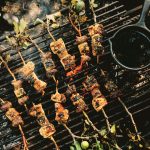 APPLE CHICKEN SKEWERS WITH MULLED CIDER TARE SAUCE AND SEVEN-SPICE SPRINKLE