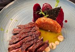 Birch Wasabi Flat Iron Steak with Kimora Rice Cake & Butter Braised Carrots